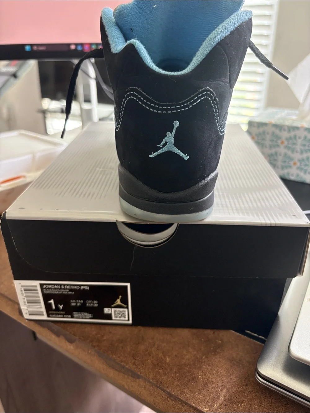 Jordan Retro Black with Light Blue Accent Sneakers